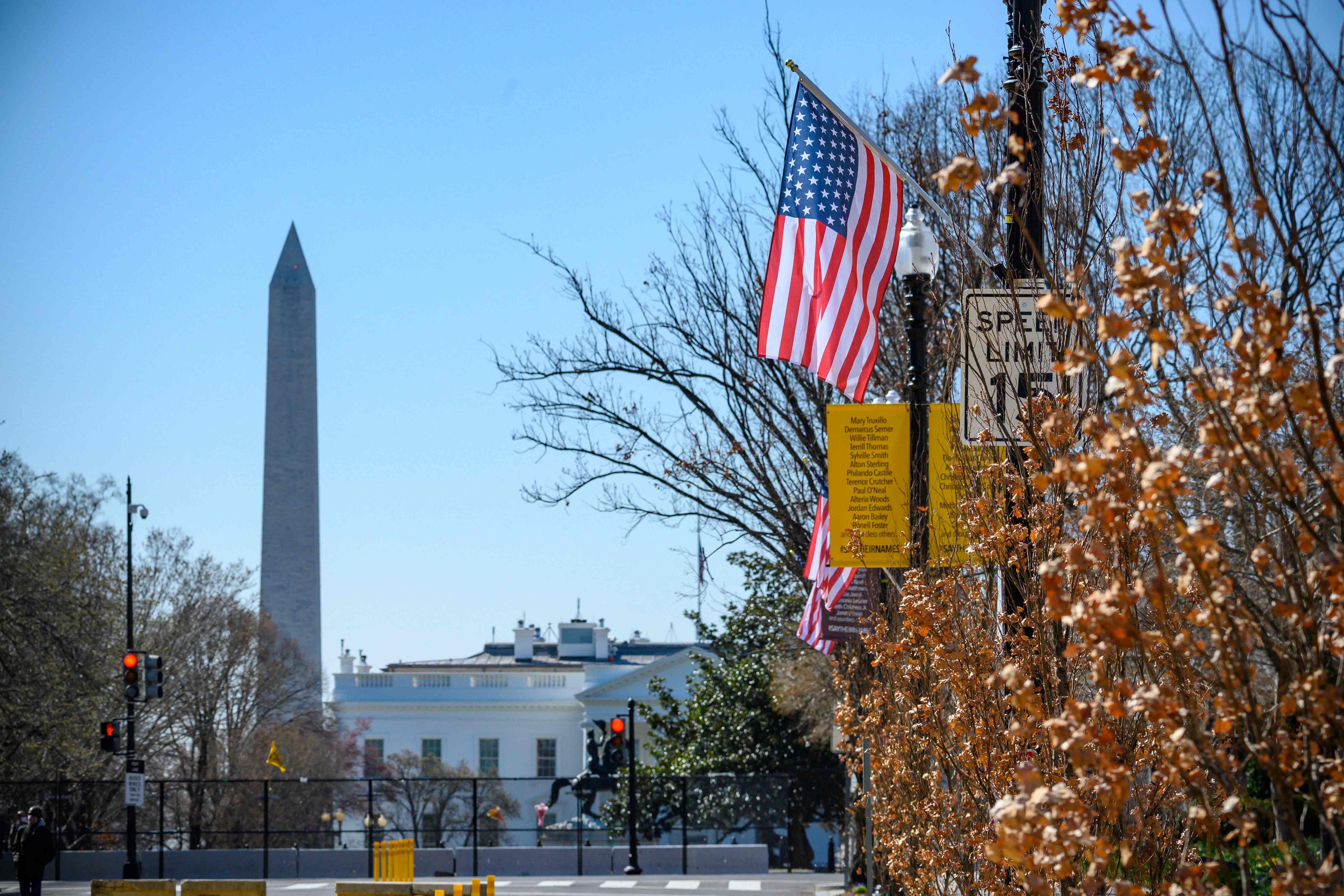 <p>The Stars and Stripes hangs over Black Lives Matter Plaza in Washington DC – with an extra star symbolising the ambition of making the District of Columbia the 51st state of the USA</p>