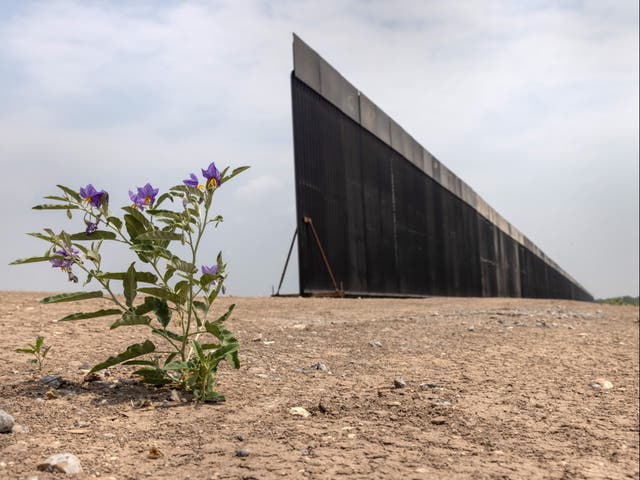 A portion of US-Mexico border wall stands unfinished on April 14, 2021 near La Joya, Texas