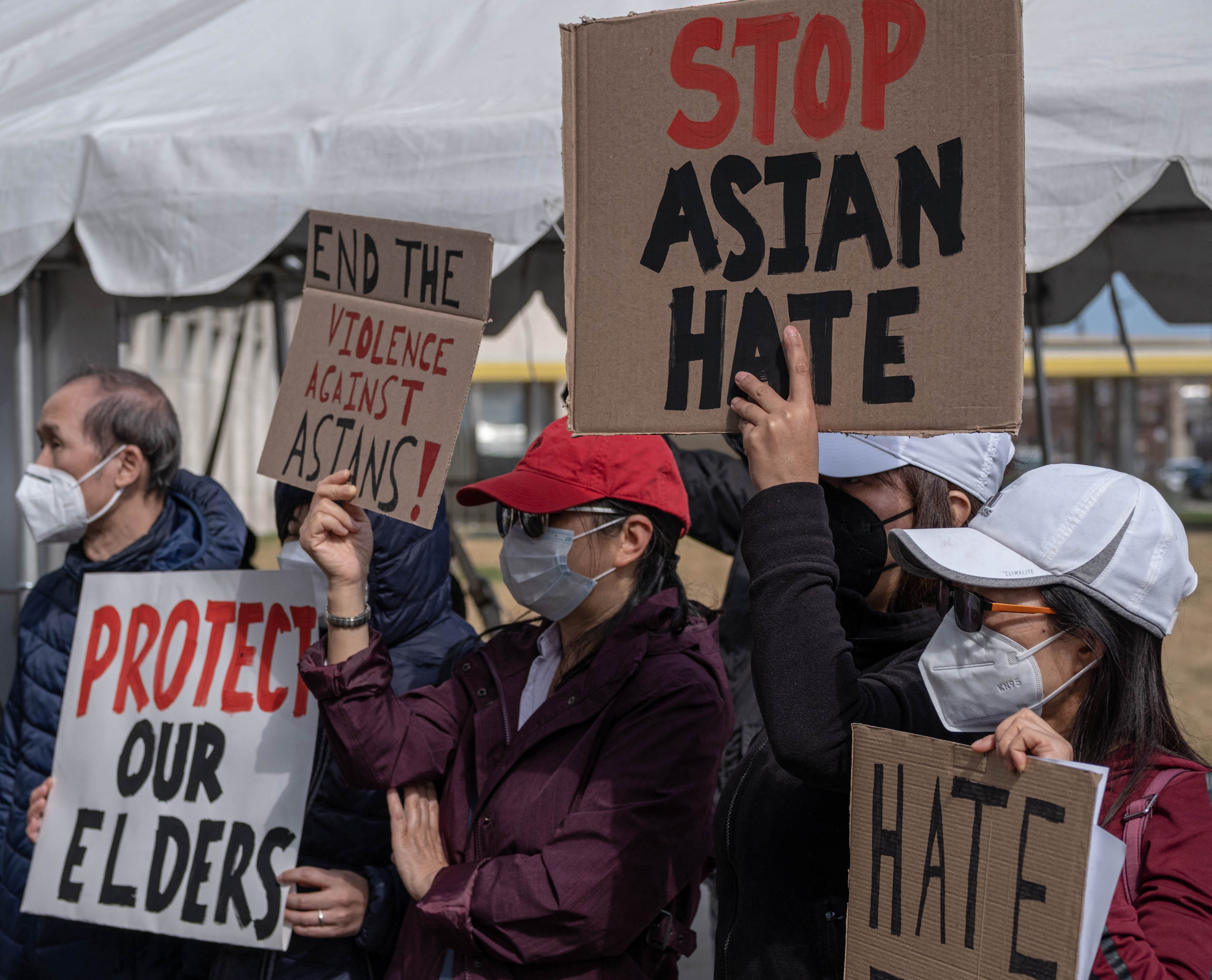 People march during a Stop Asian Hate rally in downtown Detroit, Michigan in March, as part of a nation wide protest in solidarity against hate crimes directed towards Asian Americans