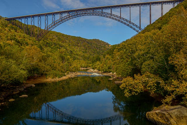 <p>The New River Gorge Bridge is seen from Fayette Station in Fayetteville, WVa A program launched Monday on 12 April 2021</p>