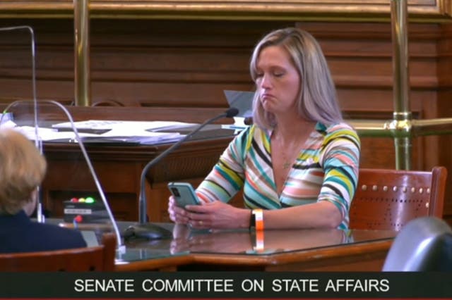 <p>Amber Briggle speaking at the Texas Senate Committee on State Affairs against four bills that would criminalise parents who support their transgender children</p>