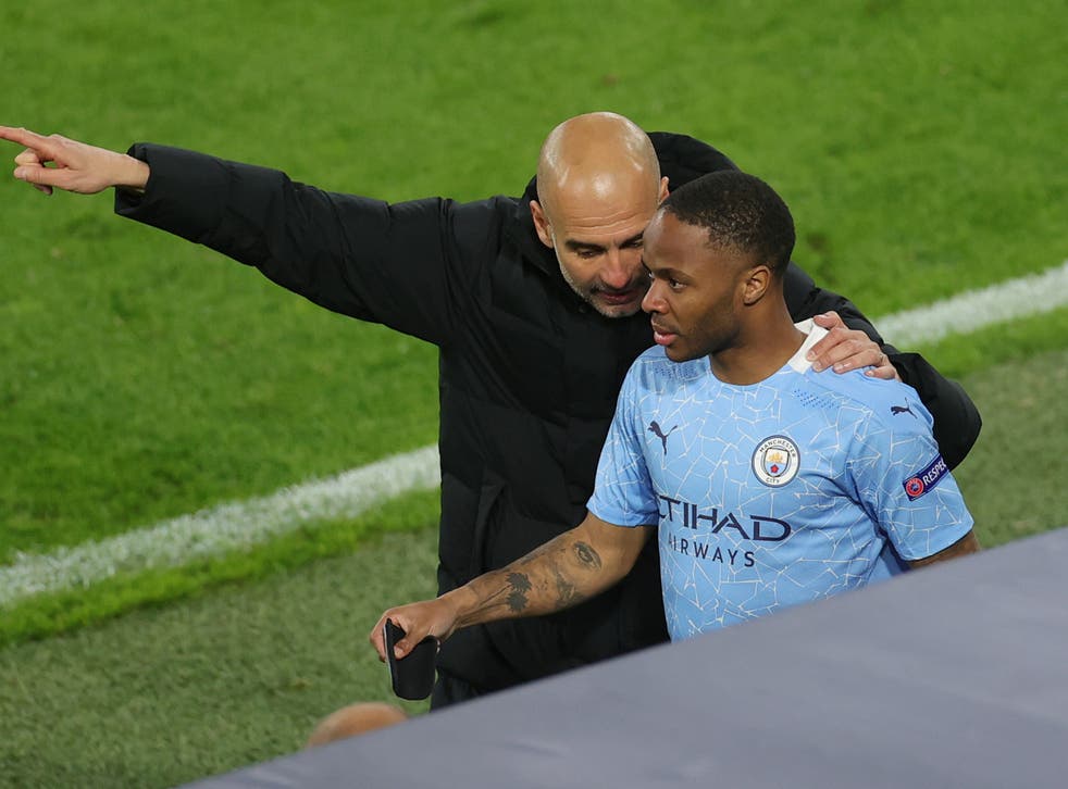 Manchester City winger Raheem Sterling with Pep Guardiola