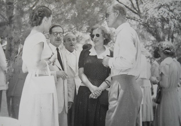 Prince Philip at the Koukouritsa estate on Corfu in 1951, in conversation with locals Moira Manessi, Angelos Lavranos, Dickie Sordinas and Isabella Sordina
