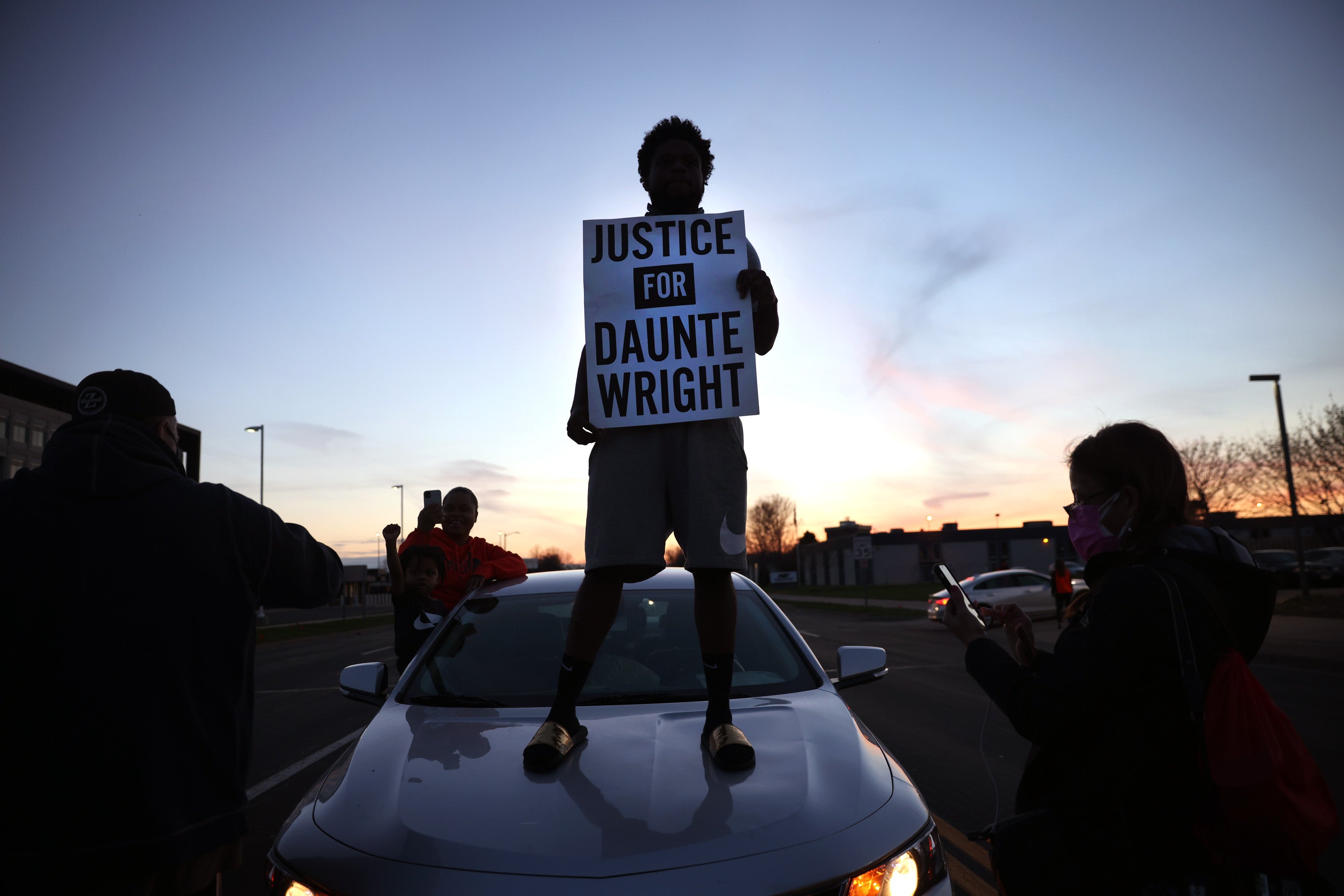 Protest near the Brooklyn Center police station on 16 April in Minnesota in the wake of the fatal shooting of 20-year-old Daunte Wright by Brooklyn Center police officer
