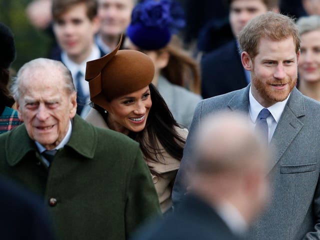 <p>Meghan and Harry with Philip in 2017</p>