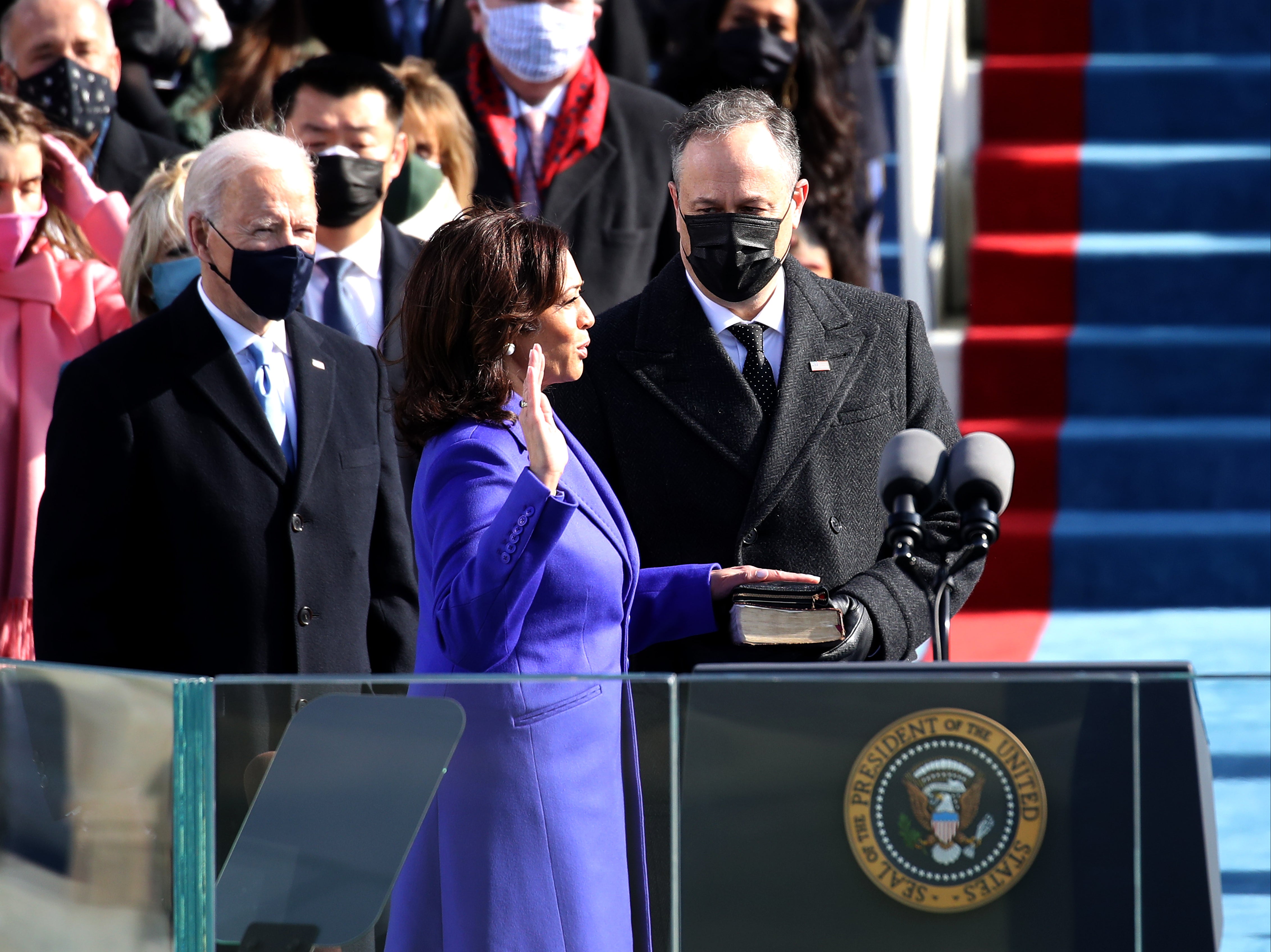 Kamala Harris is sworn in as US Vice President with her husband Doug Emhoff and President Joe Biden looking on
