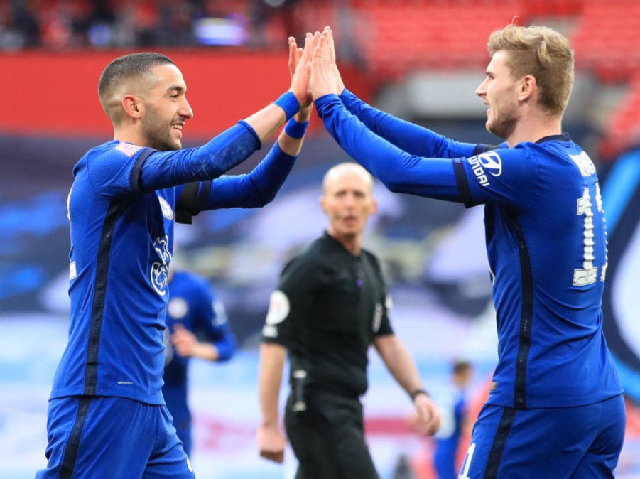 <p>Hakim Ziyech and Timo Werner celebrate at full time</p>