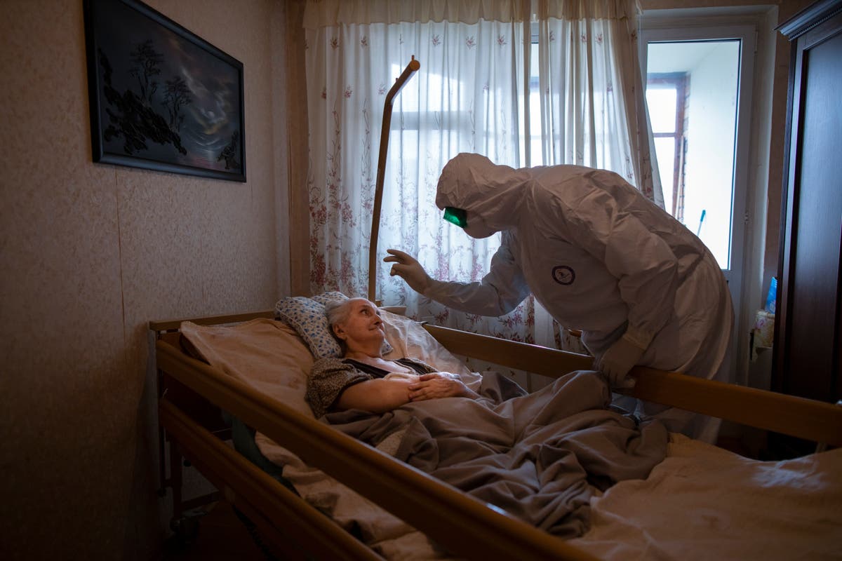 AP PHOTOS: Photographers reflect on single shot of pandemic