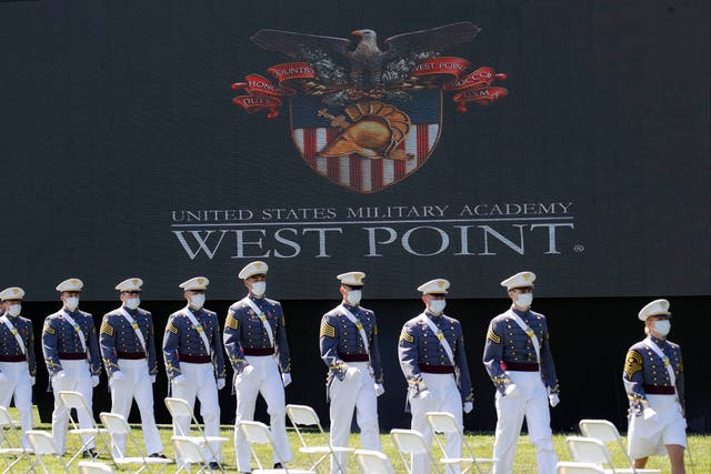 <p>Graduating cadets march to their socially-distanced seating during commencement ceremonies in West Point, New York last June</p>