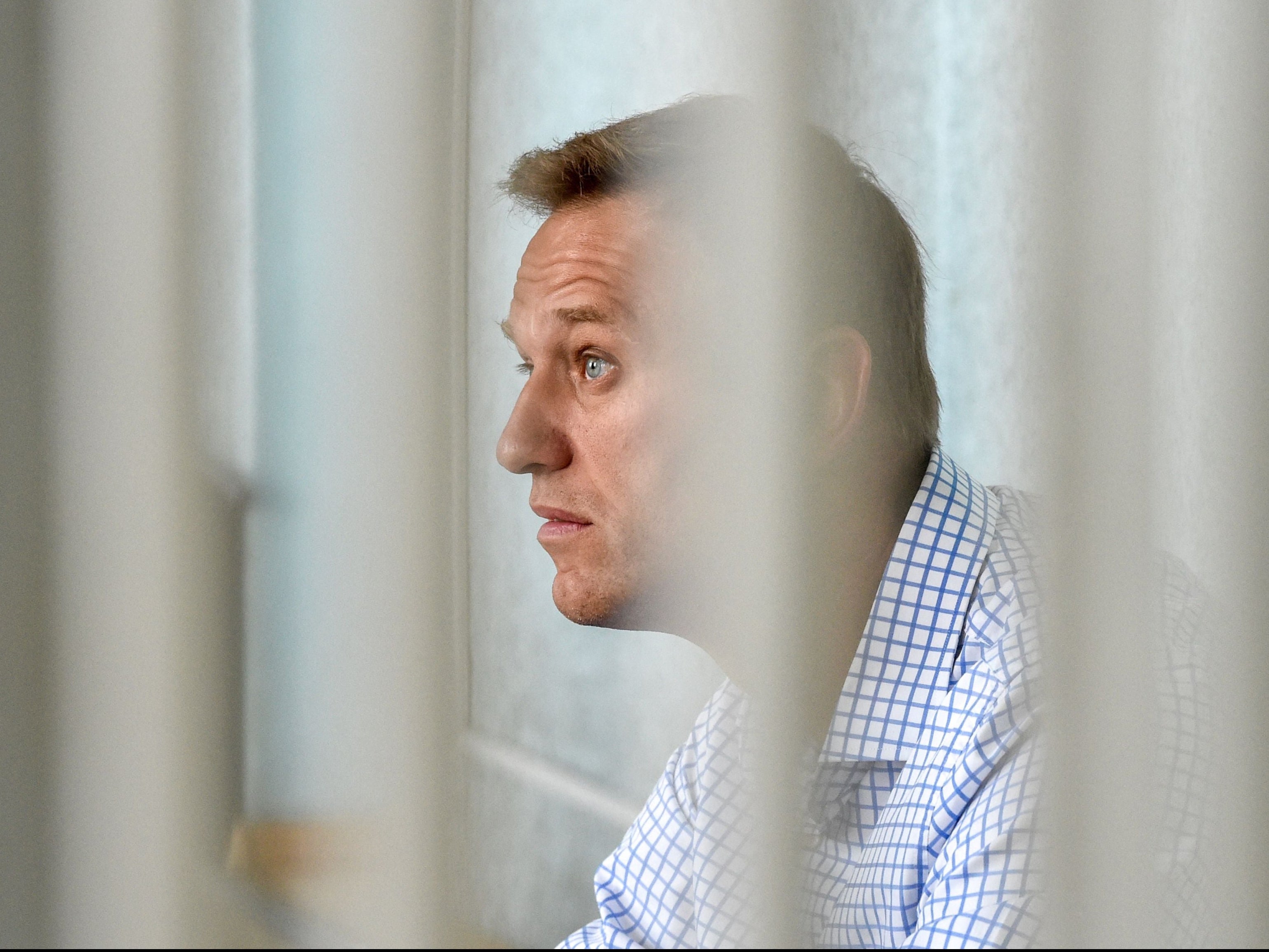 In this file photo taken on June 24, 2019 Russian opposition leader Alexei Navalny attends a hearing at a court in Moscow