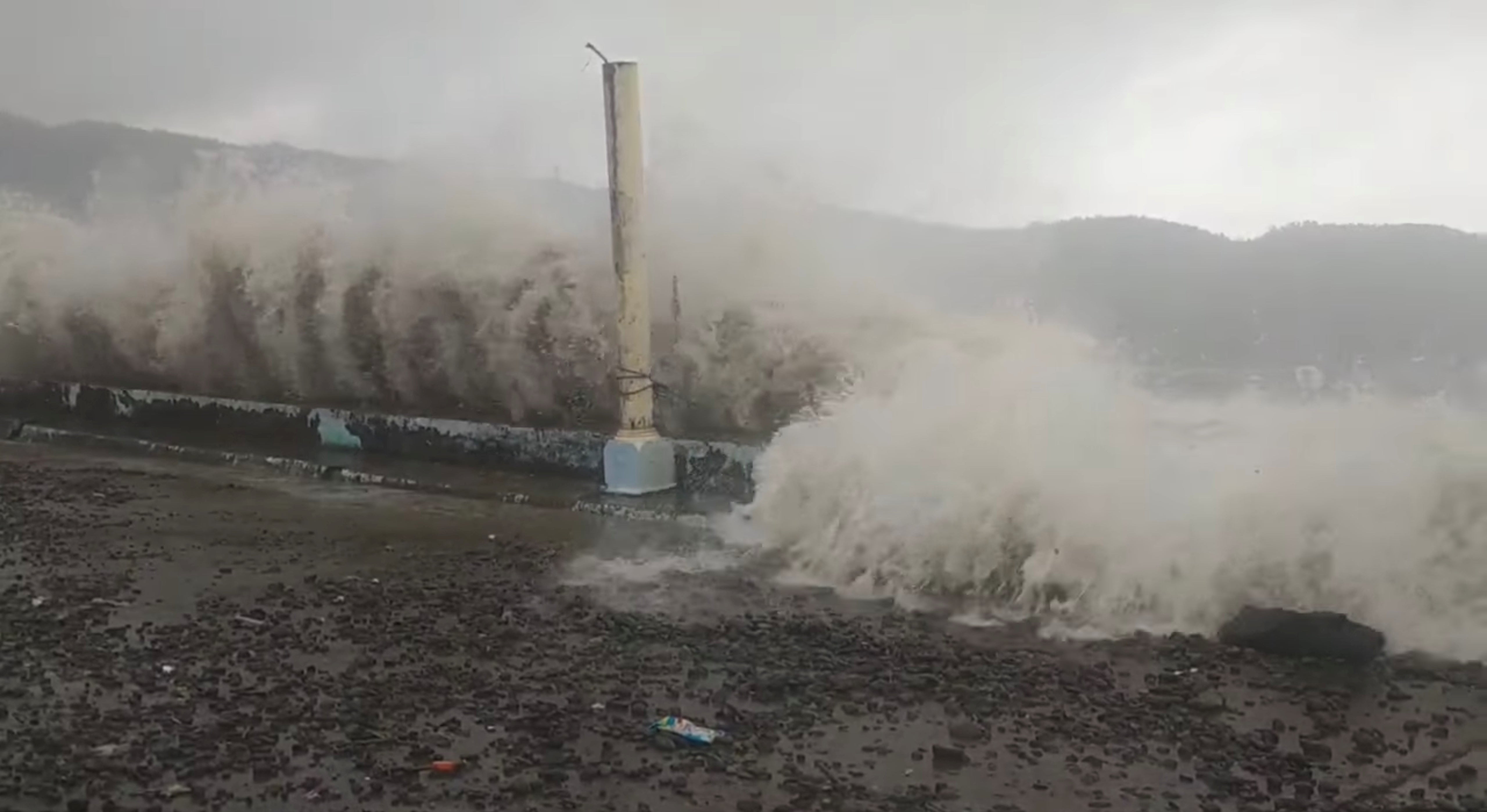 Waves crash the shore as Super Typhoon Surigae moves close to the Philippines in Gigmoto