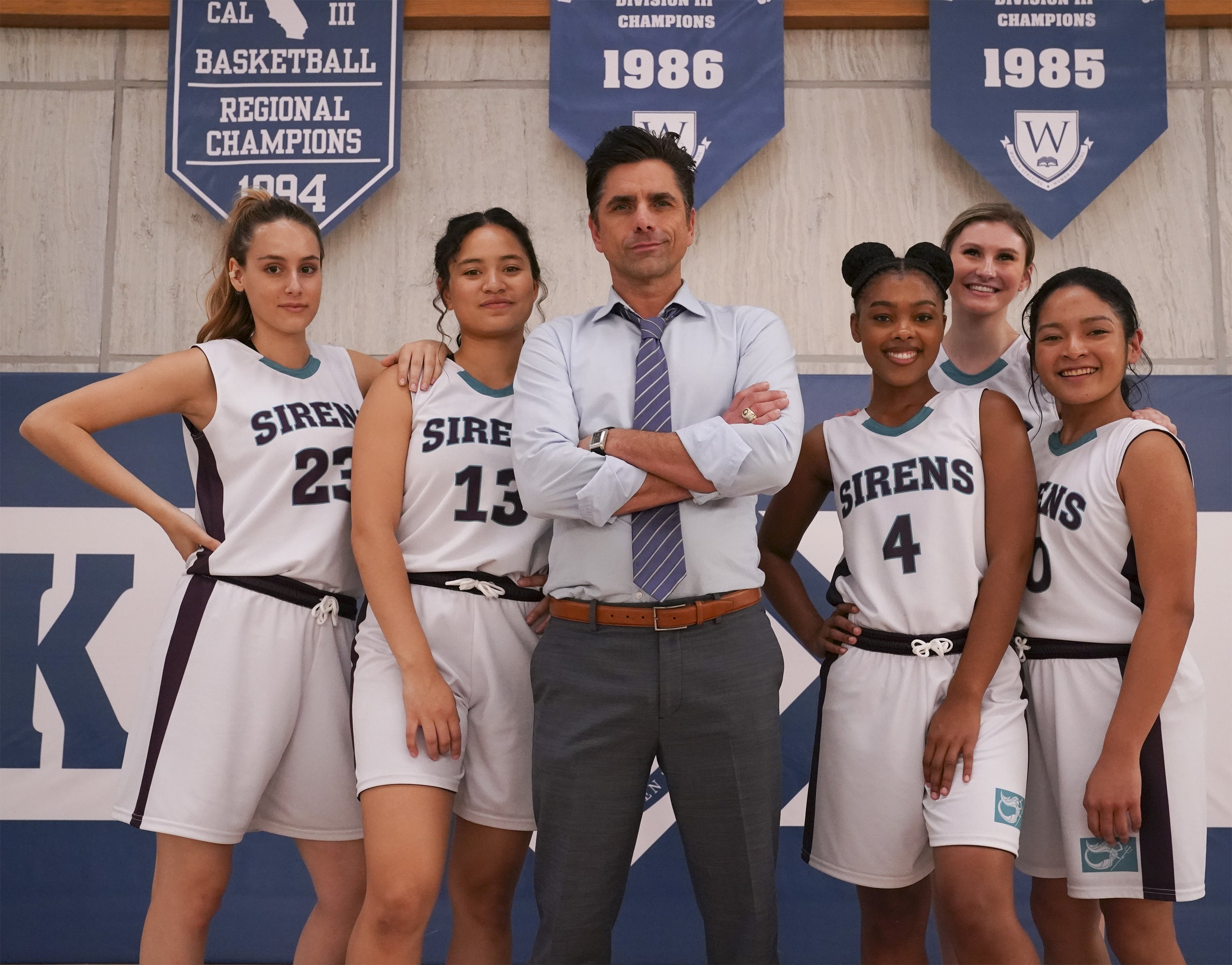 John Stamos with women's basketball team