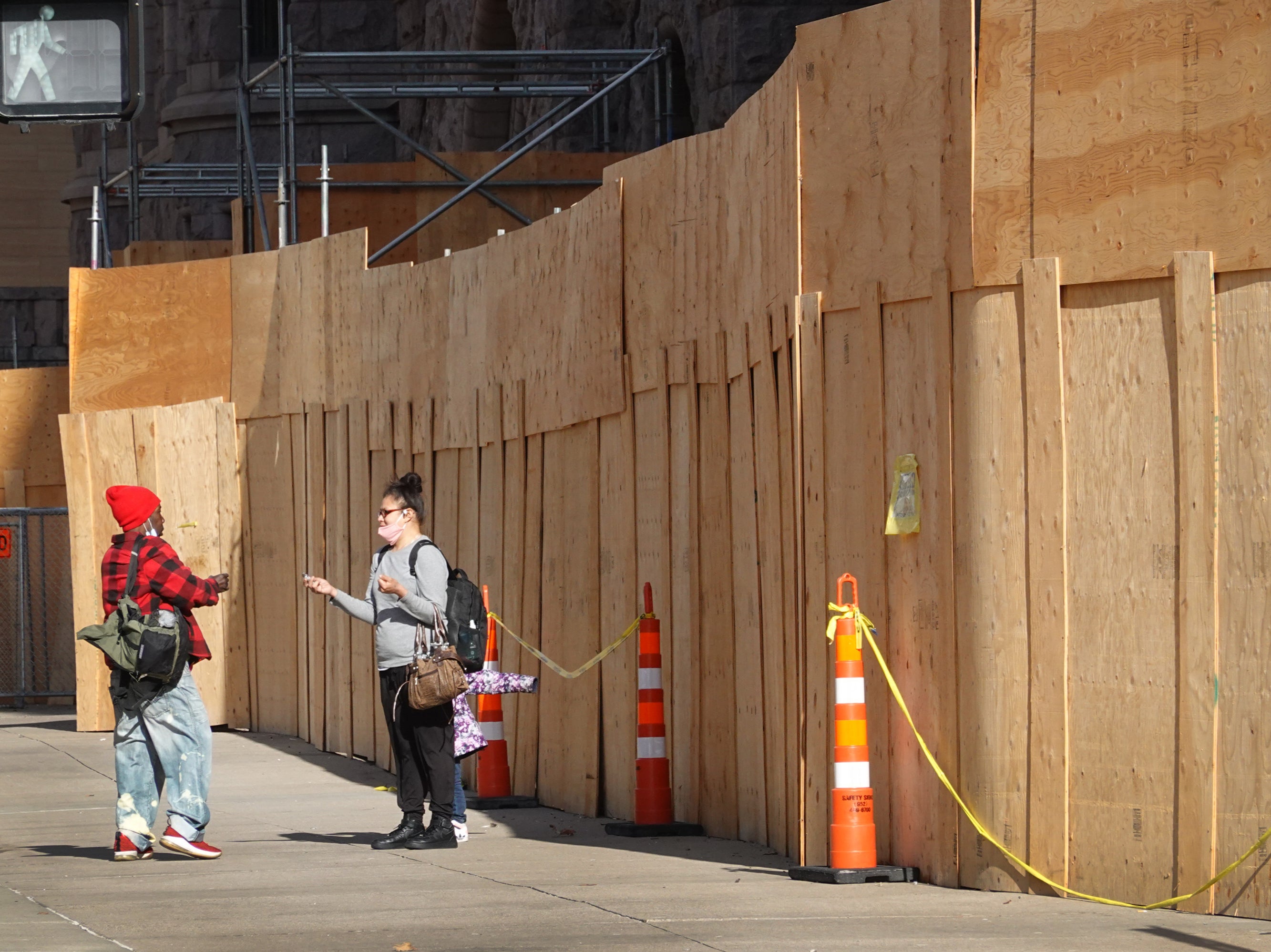 Plywood covers a building front near the Hennepin County Government Center in preparation for the trial of former Minneapolis police officer Derek Chauvin on 28 March, 2021