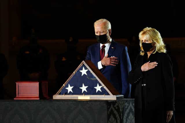 <p>US President Joe Biden and First Lady Jill Biden pay their respects to late US Capitol Police officer Brian Sicknick, as he lies in honor in the Capitol Rotunda in Washington, DC February 2, 2021</p>
