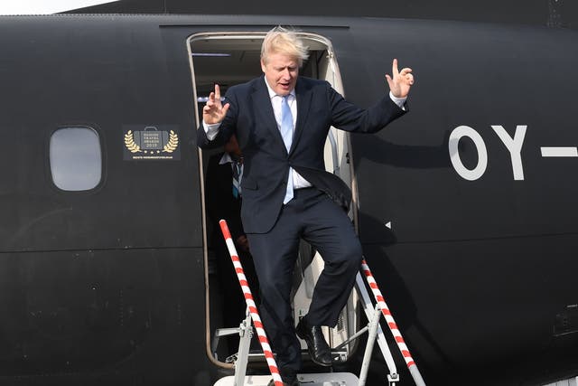 <p>Boris Johnson arrives at Cardiff airport during the 2019 general electiono campaign</p>