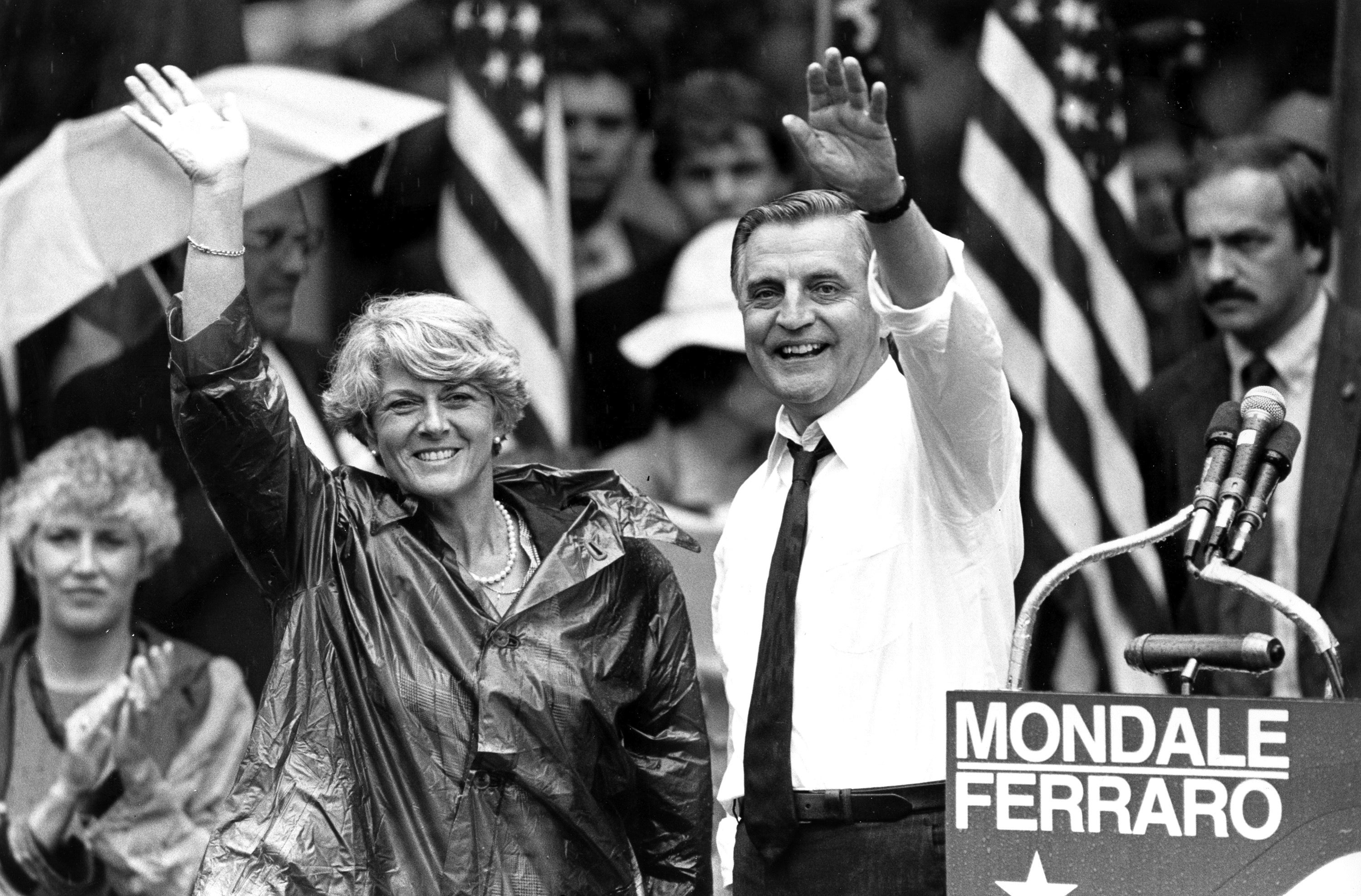 In this 1984 file photo, Democratic presidential candidate Walter Mondale and his running mate, Geraldine Ferraro, wave as they leave an afternoon rally in Portland