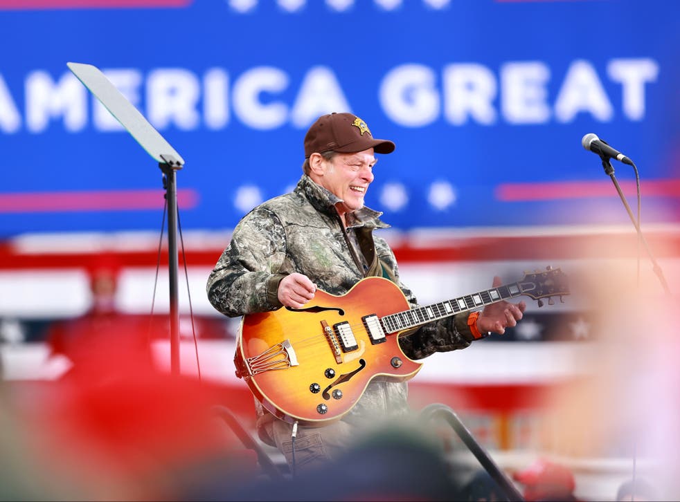 <p>Nugent on stage at a Trump campaign rally in 2020</p>