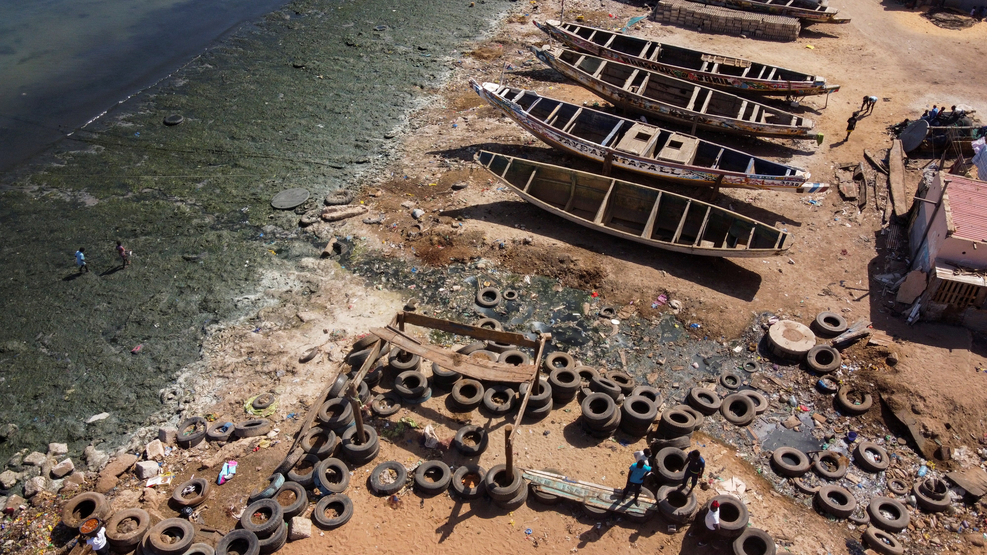 Water contaminated with raw sewage flows into the ocean at Hann Bay on the eastern edge of Dakar
