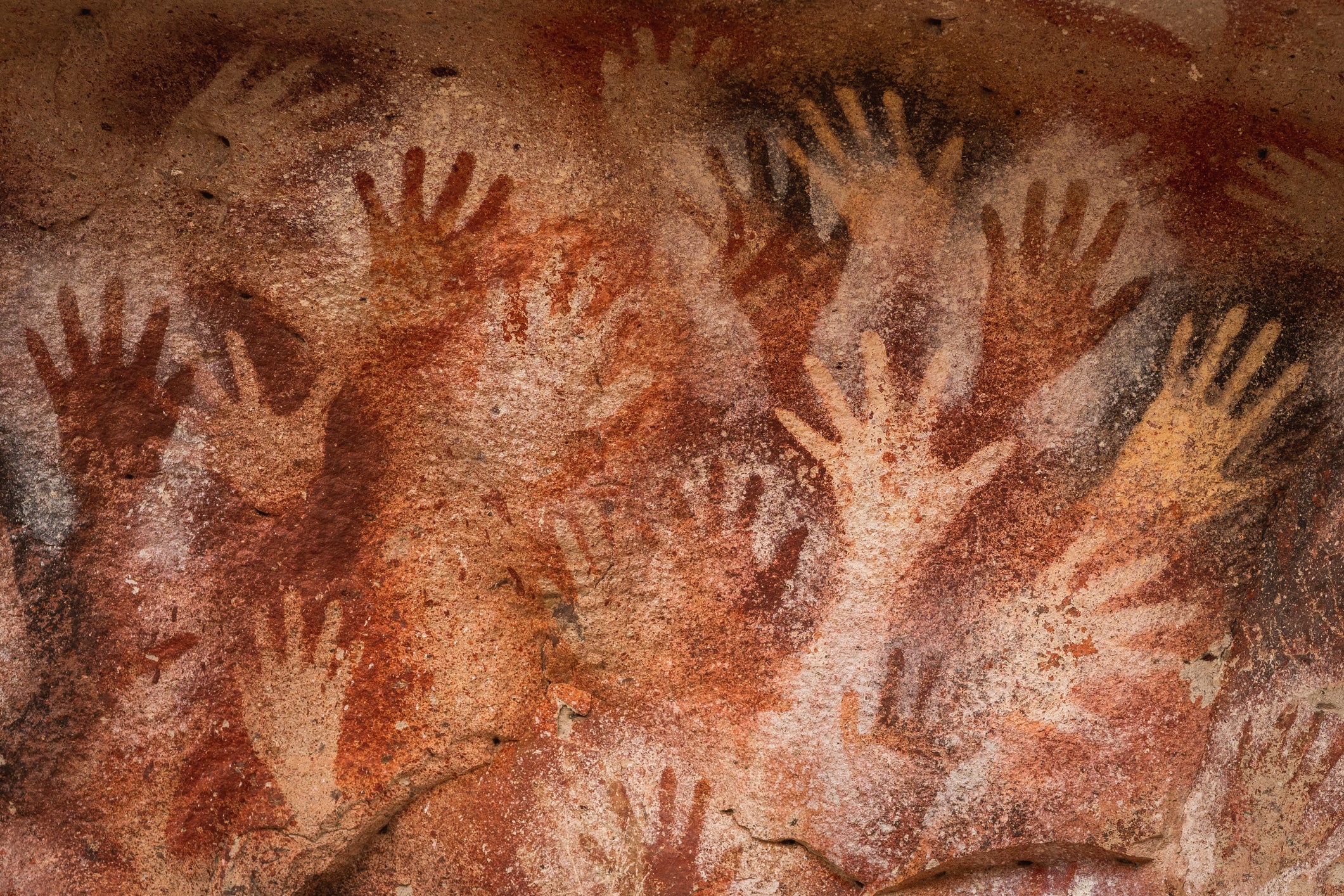 Prehistoric hand paintings at the Cave of Hands in Argentina, thought to be over 10,000 years old