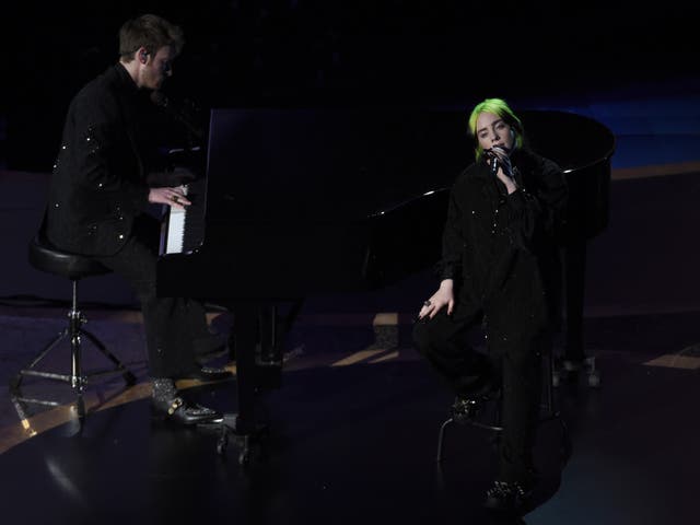 Billie Eilish and Finneas O’Connell perform during the memoriam tribute at the Oscars on 9 February 2020 in Los Angeles, California