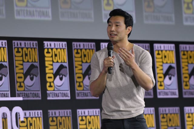 <p>File image: Simu Liu speaks on stage for the Marvel panel in Hall H of the Convention Center during Comic Con in San Diego in 2019</p>