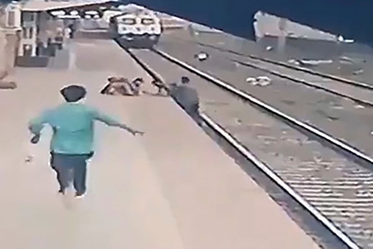 Indian rail worker saves child from train with seconds to spare