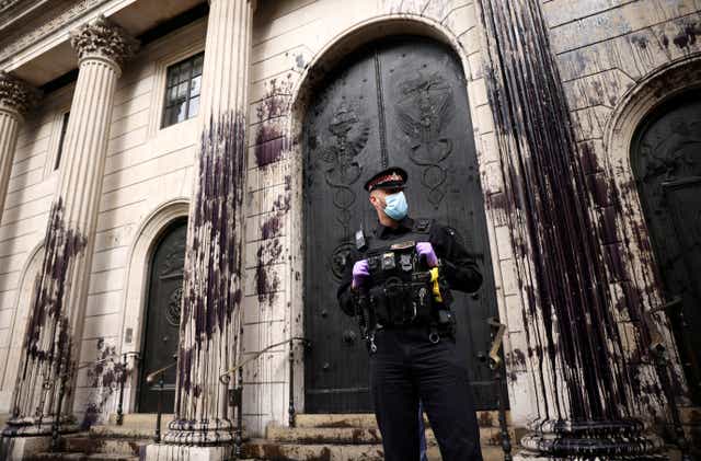Extinction Rebellion activists sprayed the Bank of England with fake oil during protests on 1 April, calling for ‘no more fossil fuels'