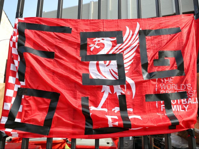 <p>A protest banner against Liverpool owners FSG outside Anfield on Tuesday</p>
