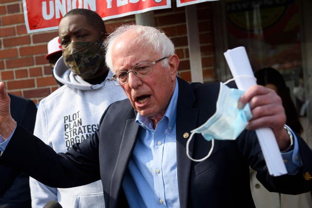 <p>Senator Bernie Sanders and Rapper Michael “Killer Mike” Render (L) speak in support of the unionization of Amazon.com, Inc. fulfillment centre workers outside the Retail, Wholesale and Department Store Union (RWDSU) in Birmingham, Alabama on 26 March 2021</p>
