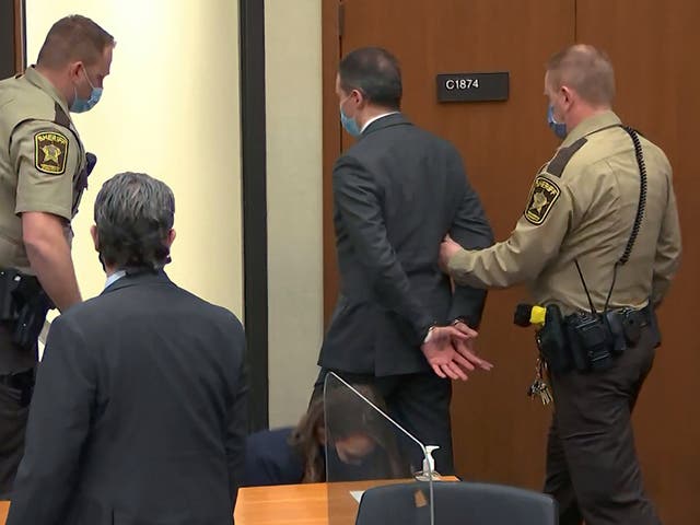 <p>Derek Chauvin listens to the guilty verdict being read by judge Peter Cahill</p>