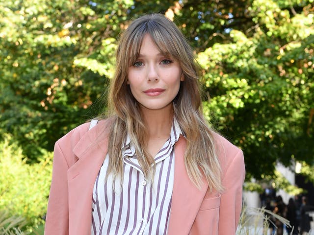 Elizabeth Olsen attends the Salvatore Ferragamo show during Milan Fashion Week on 21 September 2019 in Milan, Italy