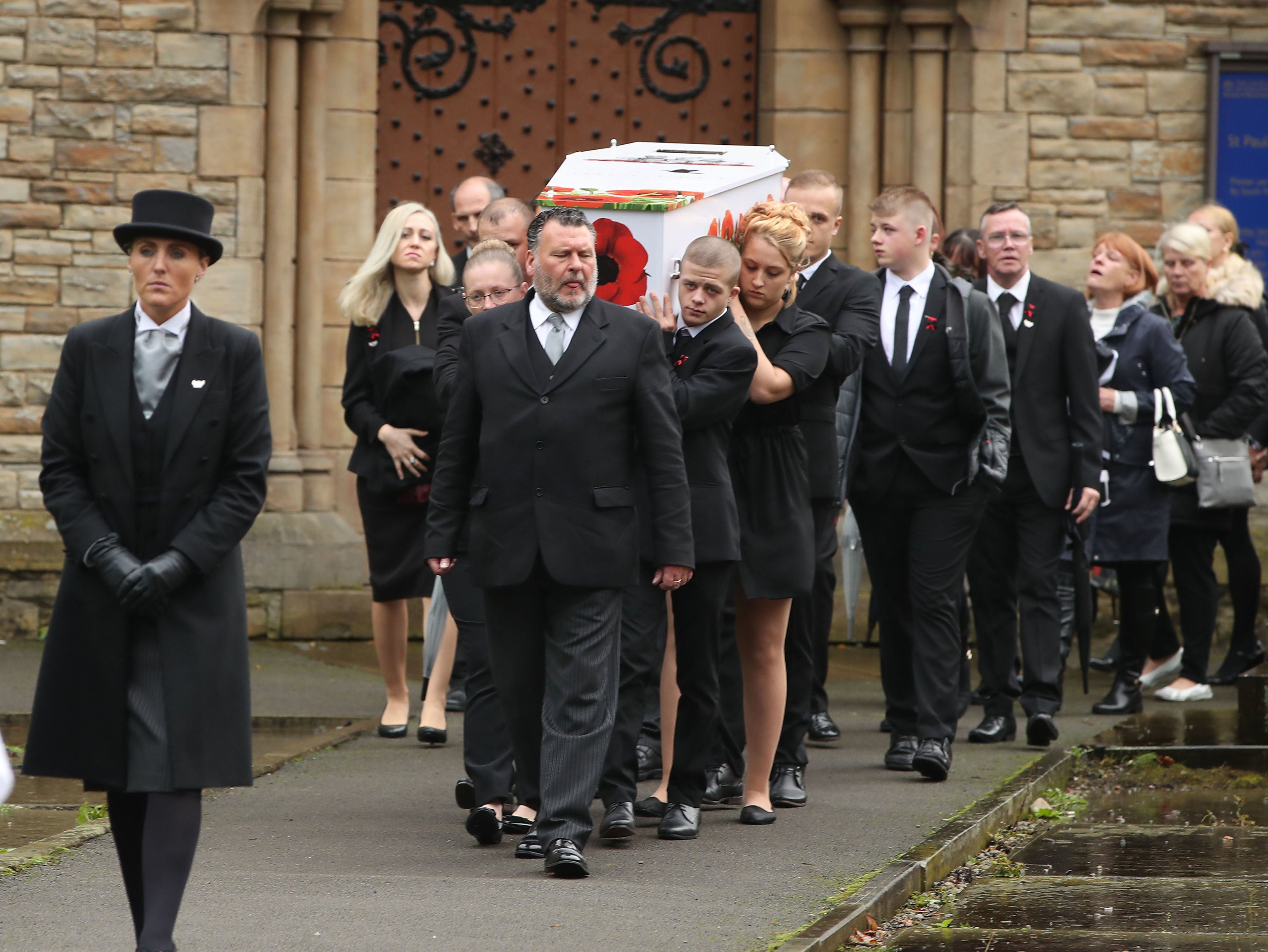 The coffin of Michelle Pearson is carried out of St Paul’s Church in Walkden, Salford, after her funeral