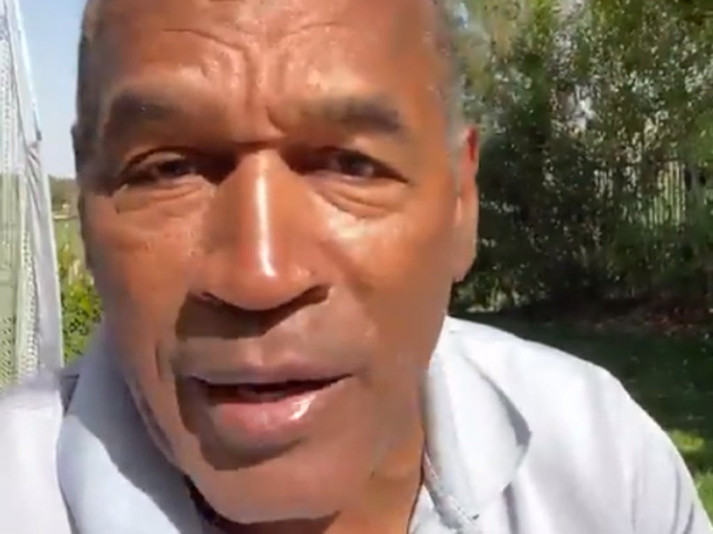 Fan’s reaction caught on video as OJ Simpson leans in for a kiss