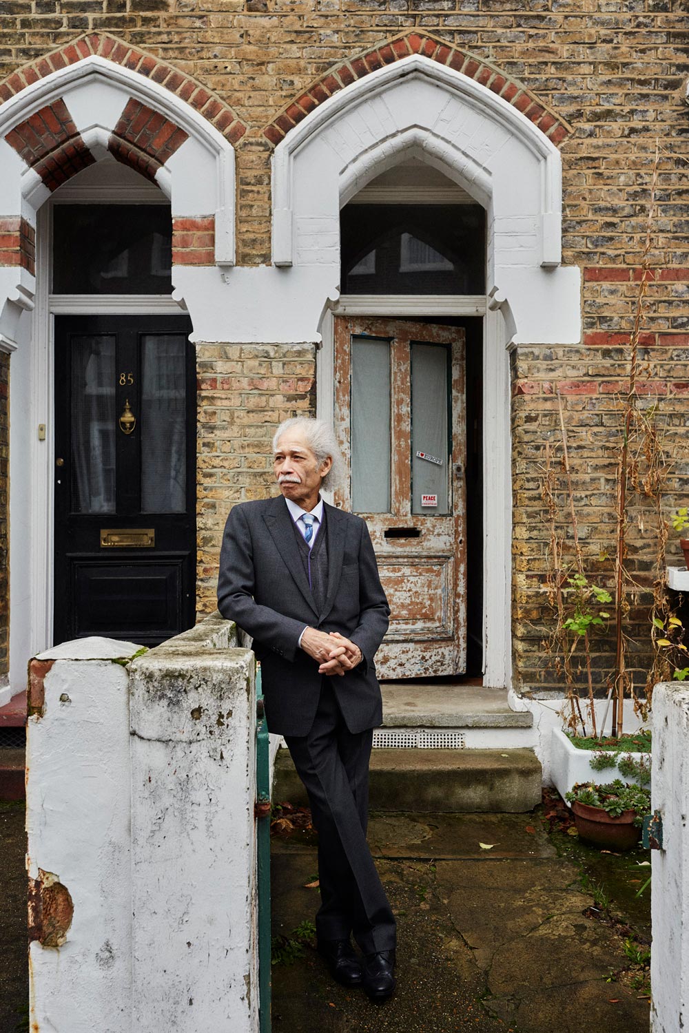 ‘I always wore my own clothes that I made. When I arrived here in my twenties, I had a jacket like Liberace with black and silver thread in it. I had a checked shirt, black trousers with white stitching down the sides, moccasins that were off-white, and lime green socks. When I see my boys in football shirts and tracksuit bottoms made of the nastiest fabric, I think to myself, they should be arrested walking around in those clothes. I wear better things to clean my car… when I had a car.’