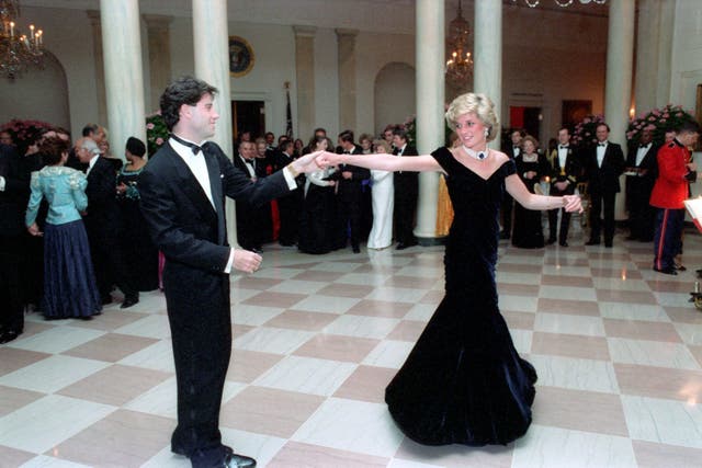 Princess Diana dances with John Travolta at a White House dinner in 1985