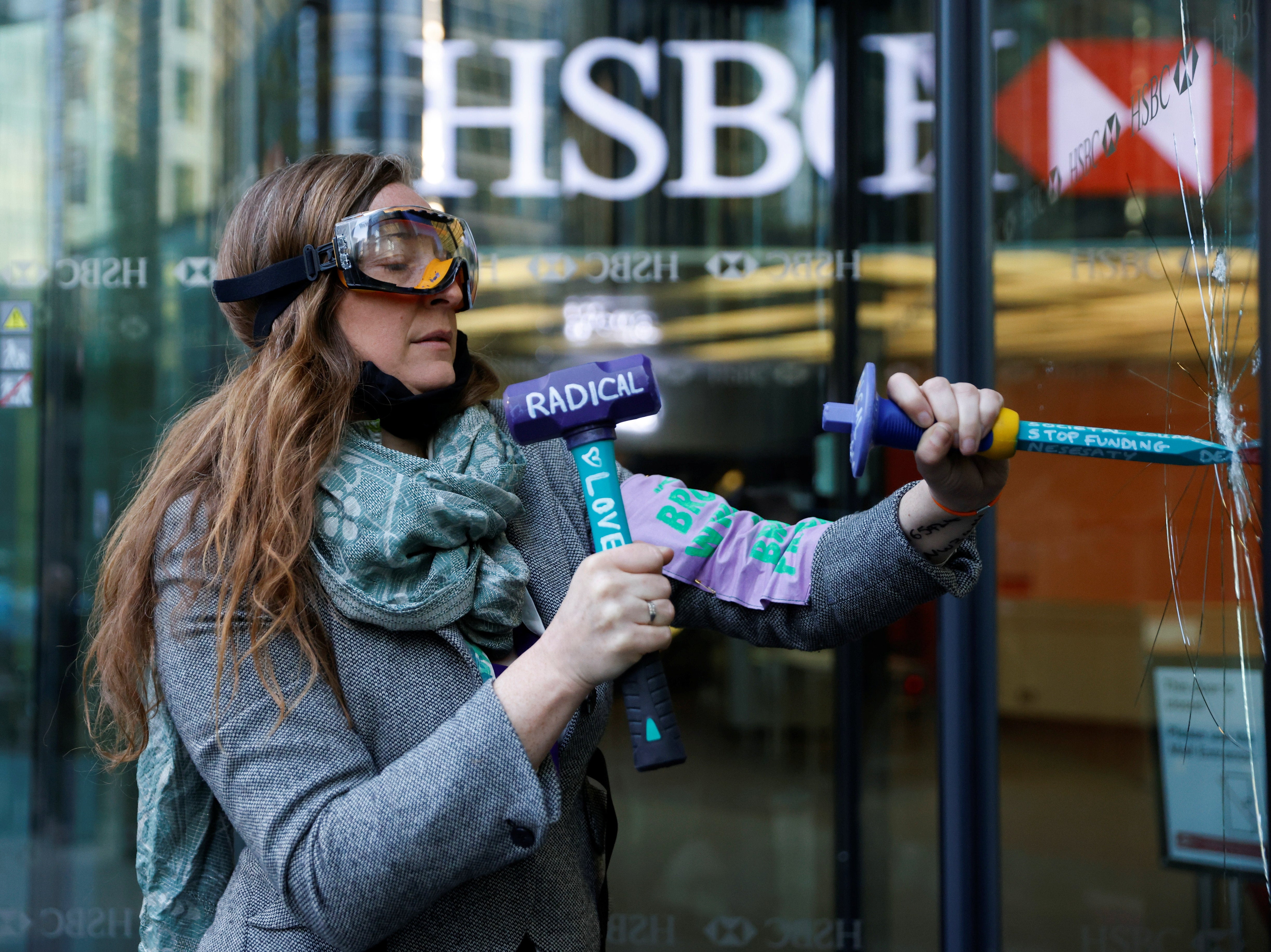 An extinction rebellion protester at HSBC
