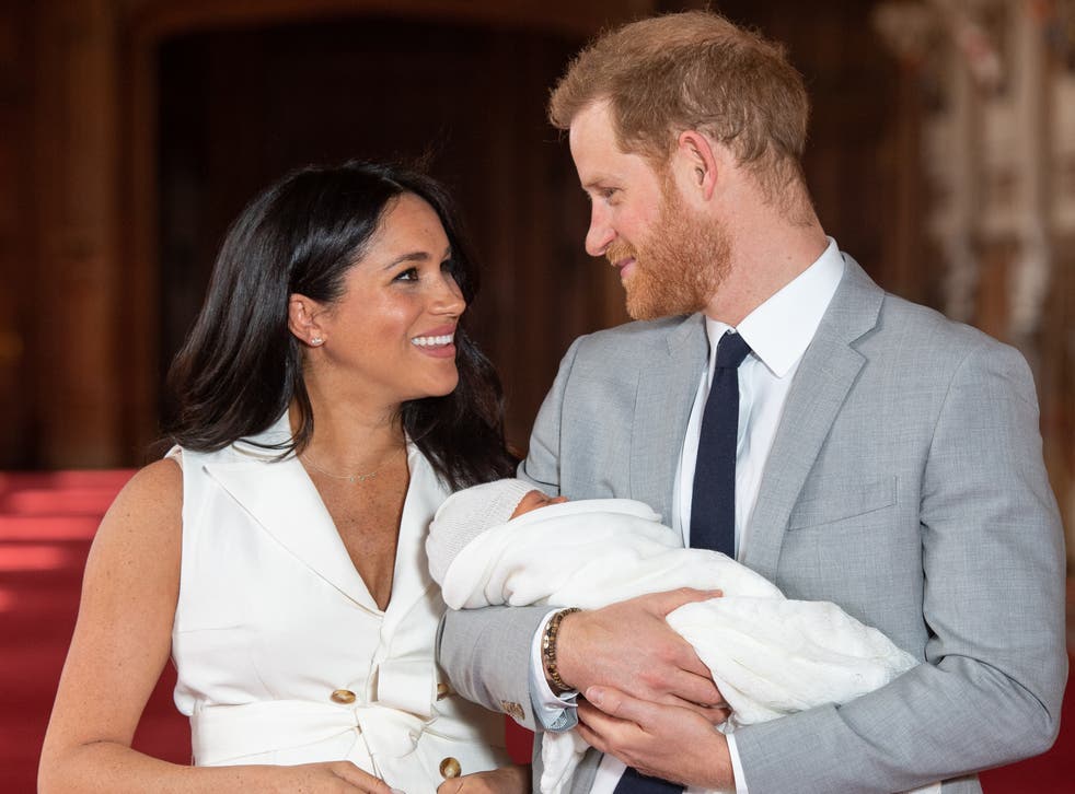 <p>The Duke and Duchess of Sussex pose with their first child, Archie, in May 2019</p>