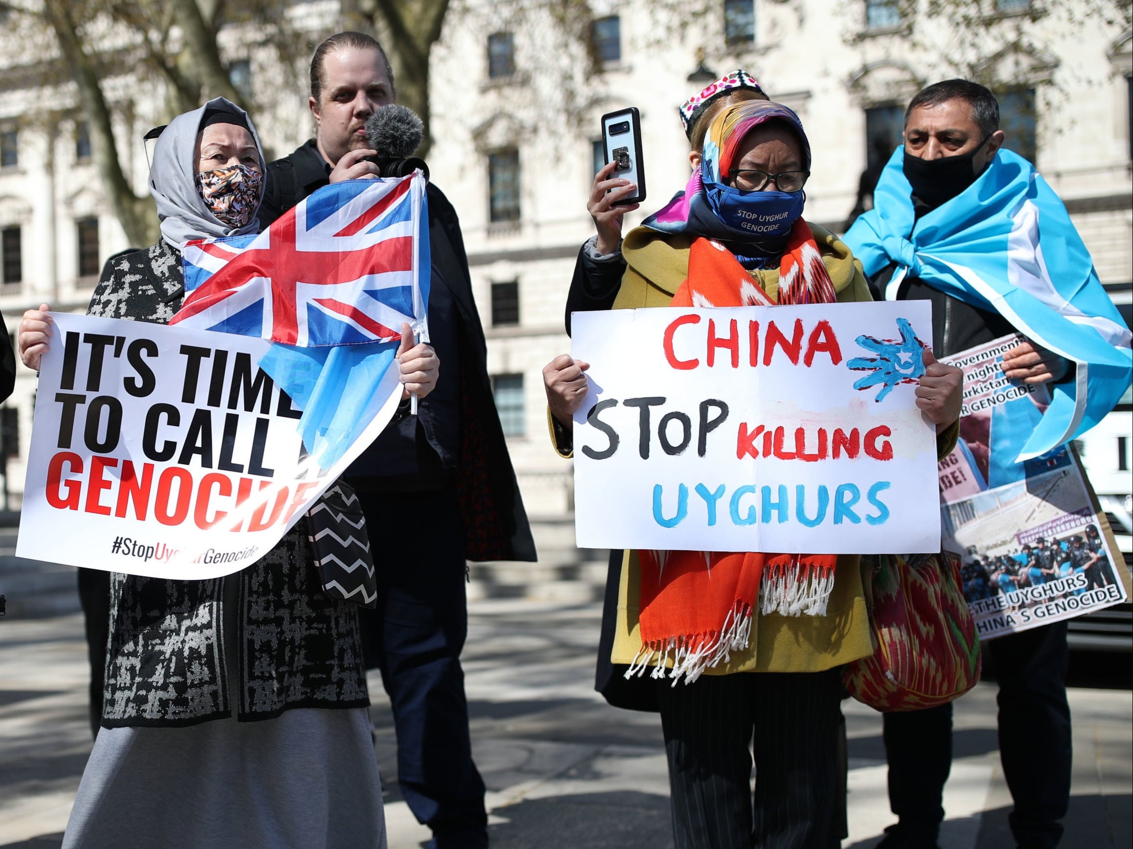 People protest in London against the atrocities carried out by China in Xinjiang province.