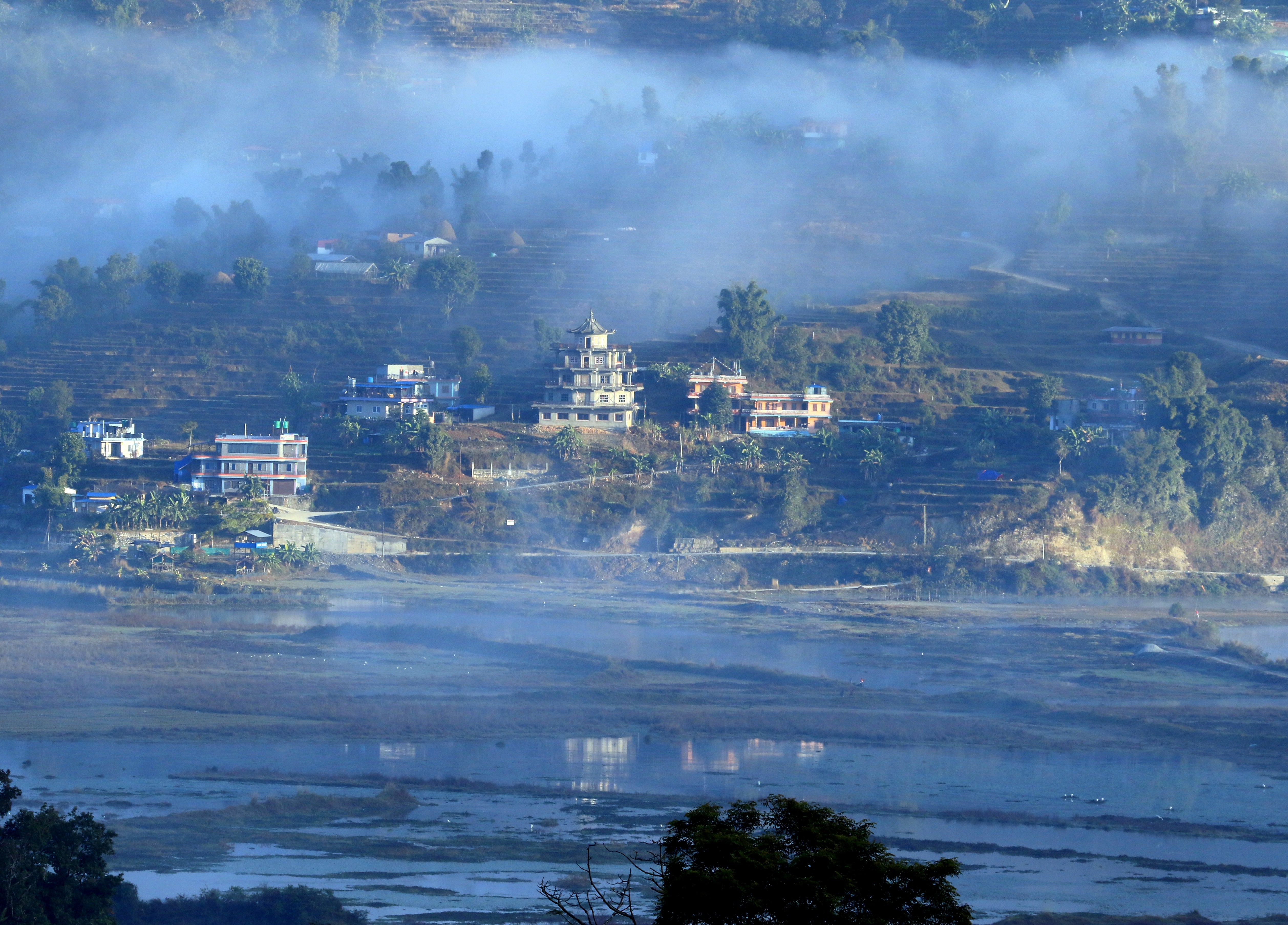 A misty morning on Phewa Lake, Pokhara