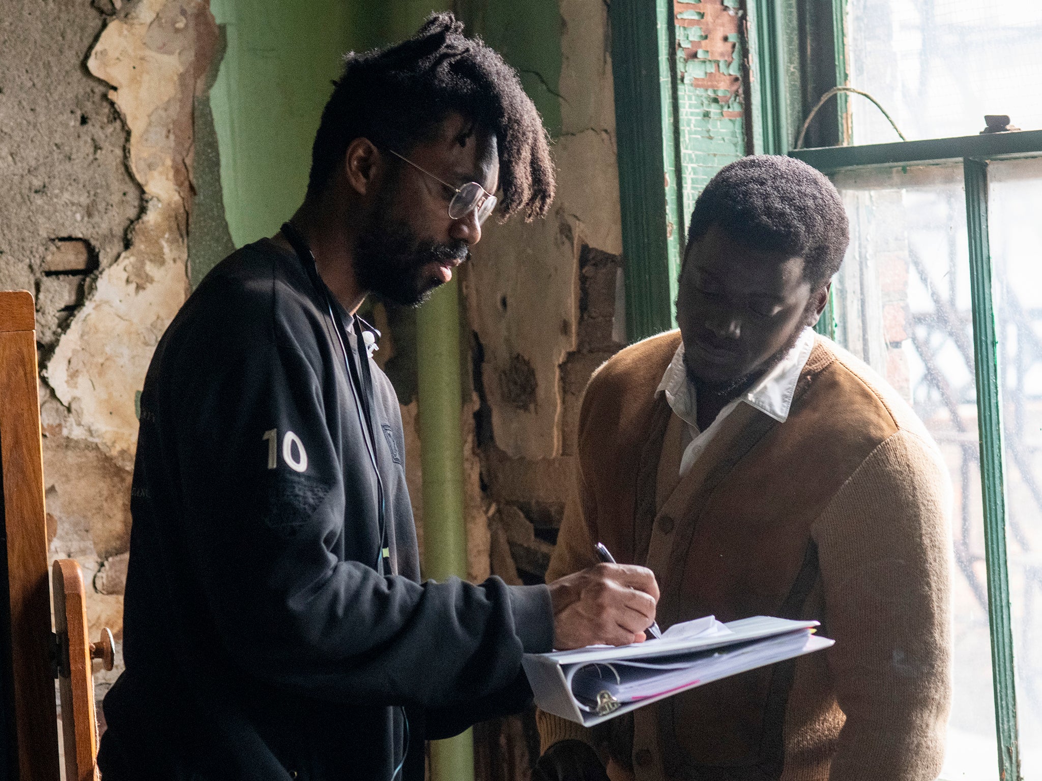 Shaka King directs Daniel Kaluuya on the set of Judas and the Black Messiah