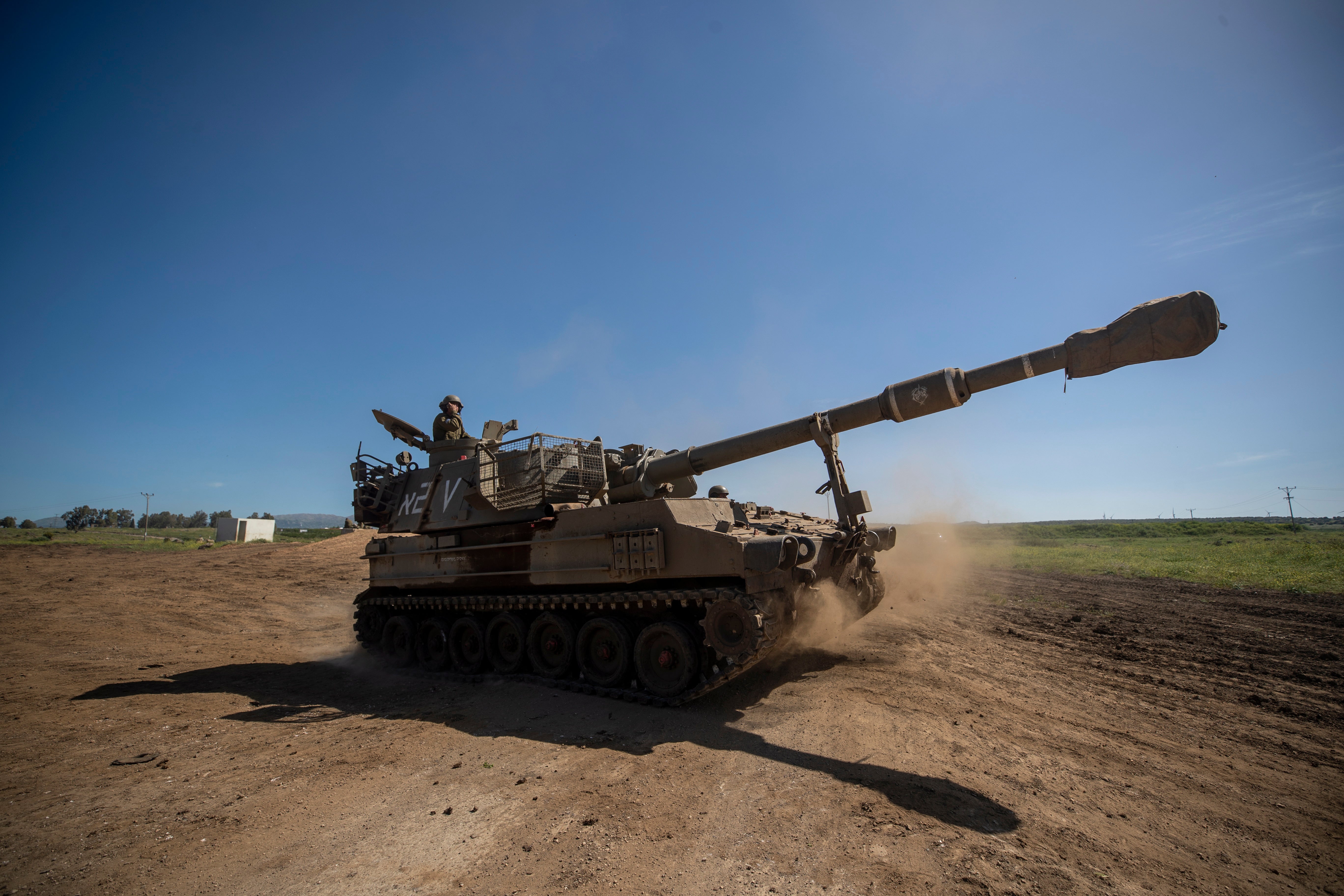 Israeli artillery unit deployed next to the Israeli-Syrian border on Thursday