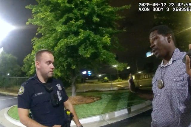 <p>In this June 12, 2020, file photo from a screen grab taken from body camera video provided by the Atlanta Police Department Rayshard Brooks, right, speaks with Officer Garrett Rolfe, left, in the parking lot of a Wendy's restaurant, in Atlanta.</p>