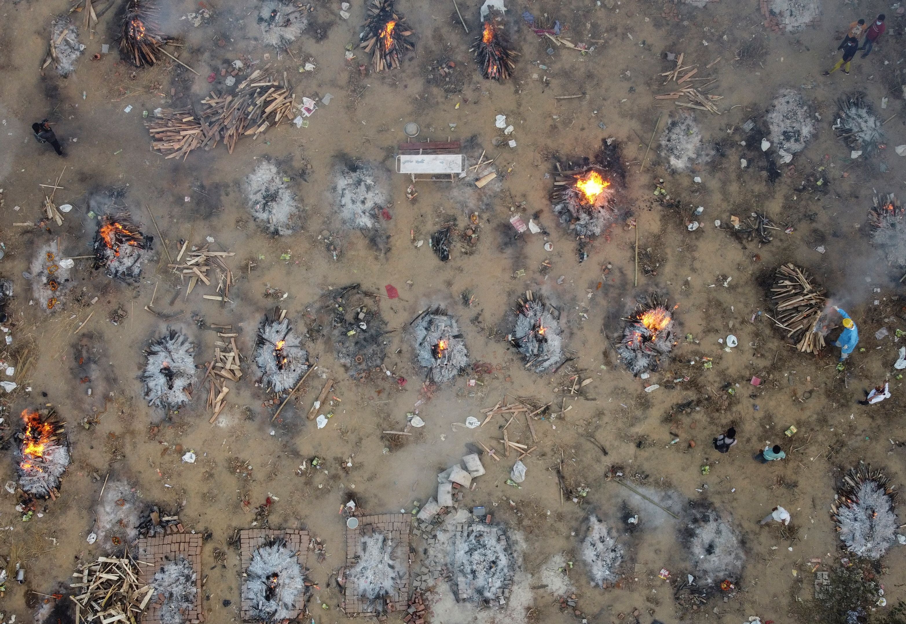 Mass cremation of victims of coronavirus at a crematorium ground in New Delhi