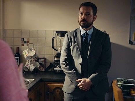 Spot the kitchen tile behind Arnott (Martin Compston)