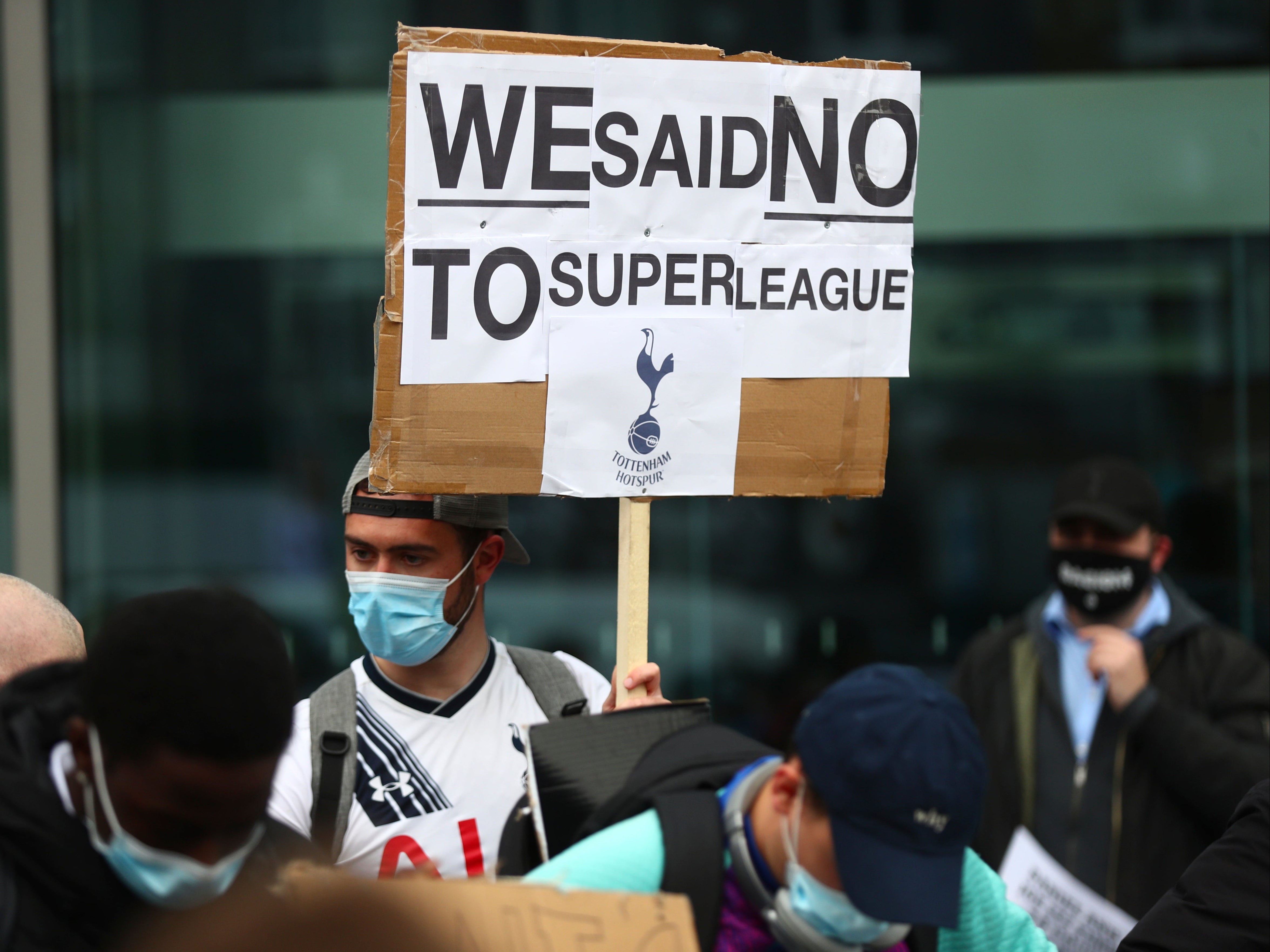 Football fans voice their anger outside Tottenham Hotspur Stadium