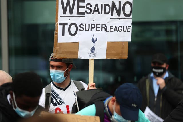<p>Football fans voice their anger outside Tottenham Hotspur Stadium</p>