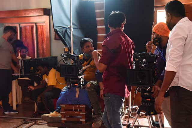 <p>File image: A camera crew works on a Bollywood film set on Madh Island off the coast of Mumbai</p>