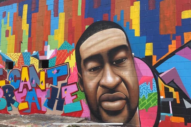 El mural en Houston, Texas, pintado por Daniel Anguilu, que se muestra aquí en Twitter antes de que fuera desfigurado esta semana con graffiti racista.
