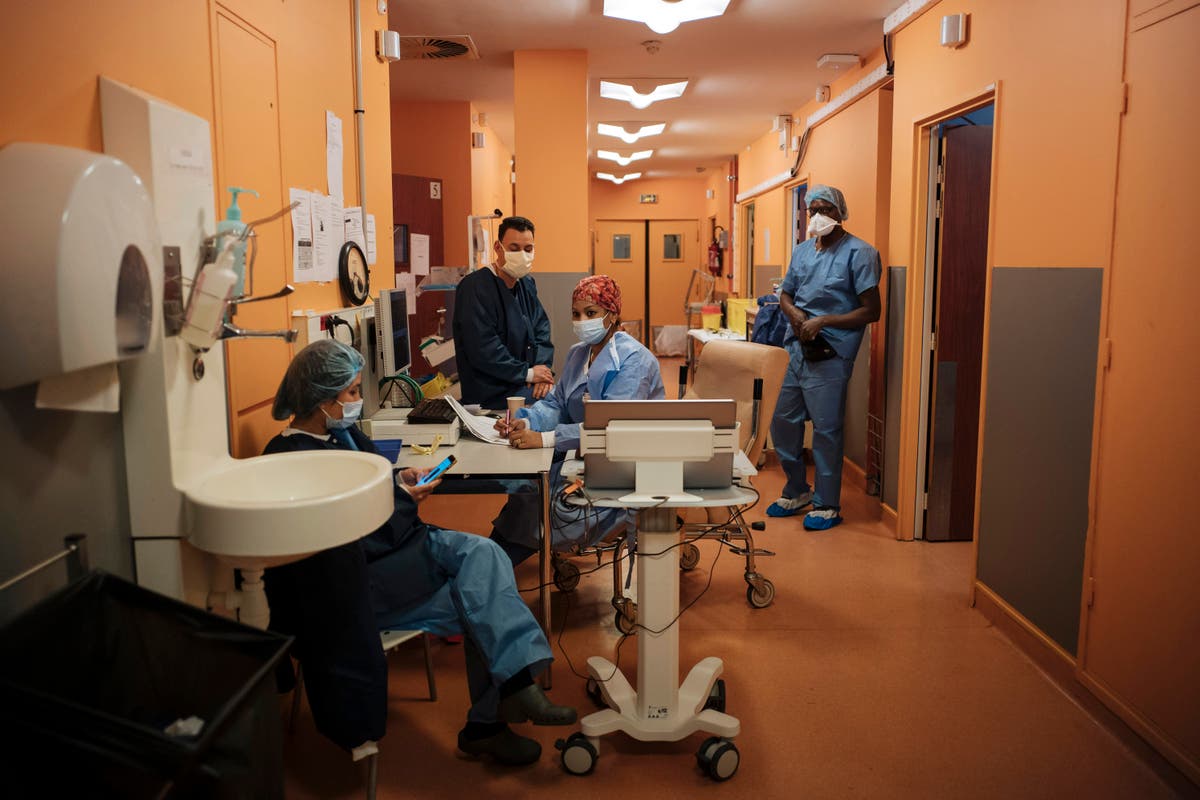 As Europe reopens, ICU teams stick with the sick and dying 
