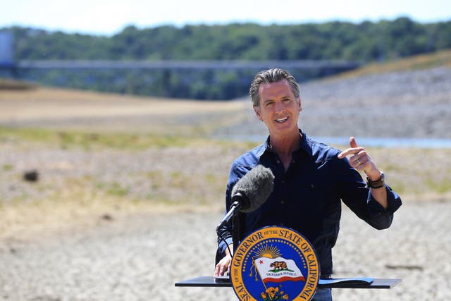 <p>California Gov Gavin Newsom speaks at a news conference in the parched basin of Lake Mendocino in Ukiah, California on Wednesday, 21 April 2021</p>